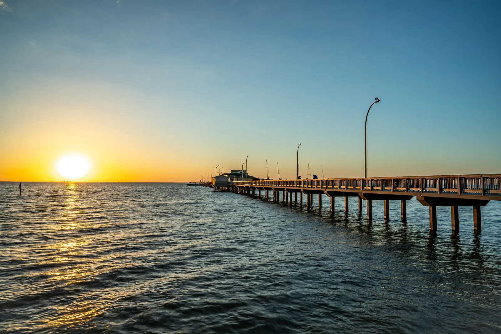 The public pier in Fairhope, Alabama, at sunset